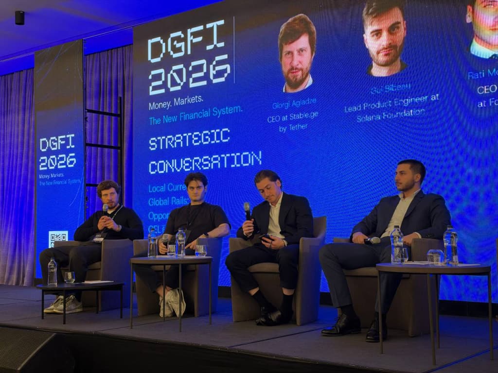 Panelists seated under the DGFI 2026 Money. Markets. The New Financial System. screen.